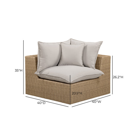 Angled front view of cream cushion and natural wicker Cali corner chair