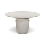 Side profile of Margot indoor outdoor round dining table showcasing organic Wabi Sabi silhouette