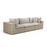 Cali 120-inch outdoor sofa styled with neutral accent pillows