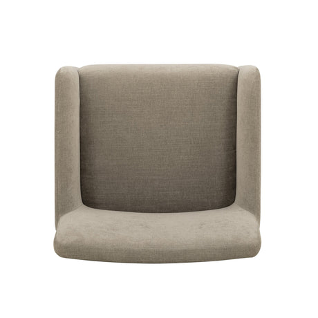 Crawley sculptural dining chair armrest detail with dense foam padding