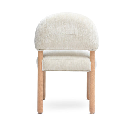Rear angled perspective of Bruno chair displaying smooth solid oak joinery