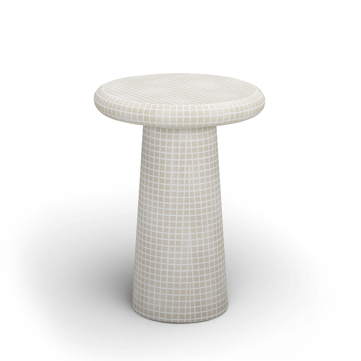 Monica sculptural tiled side table styled beside a modern lounge chair