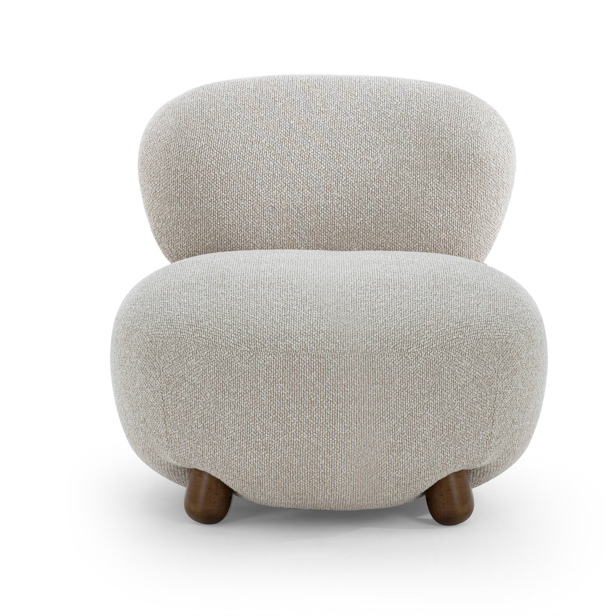 Side profile view of the Pucker Accent Chair showing curved backrest and solid wood ball feet