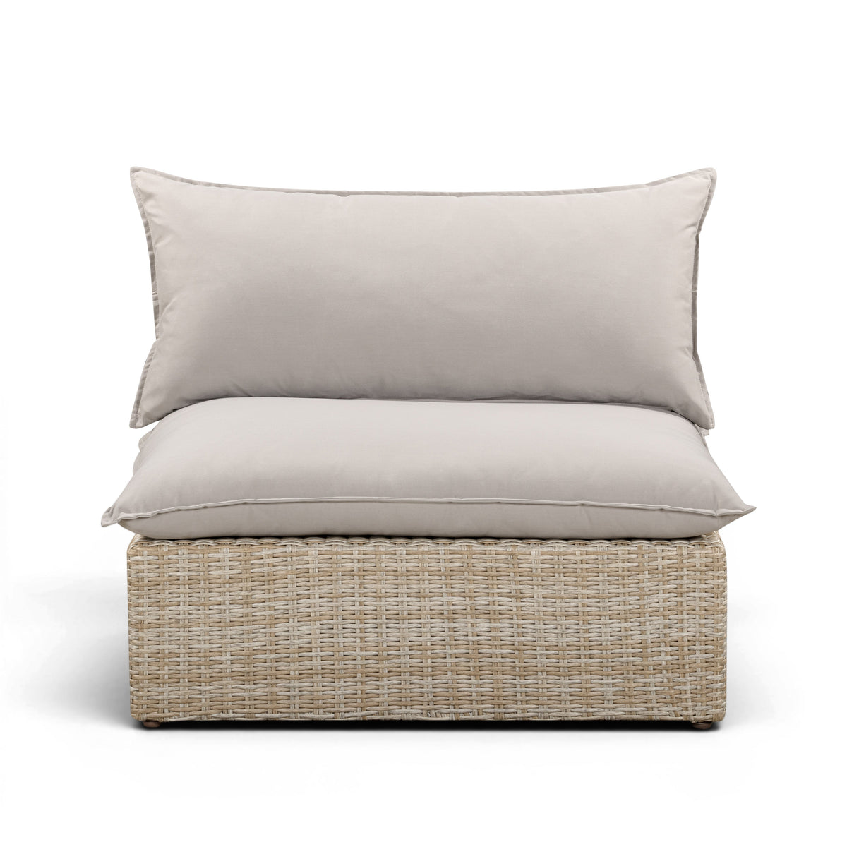 Cali wicker patio armless chair with grey cushions shown at a three-quarter angle