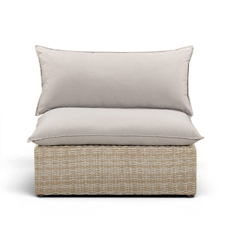Cali outdoor armless chair in natural wicker with grey performance fabric seat and back cushion front view
