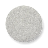 Close view of durable welt cord piping around the rim of Tassy Round Ottoman