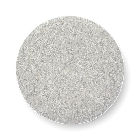Close view of durable welt cord piping around the rim of Tassy Round Ottoman