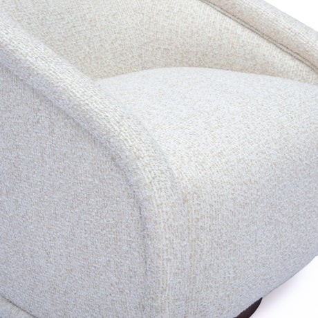 Back profile view of modern curved shelter back Clarke cream boucle armchair