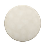 Side profile of Memphis style round concrete end table with tiled pedestal