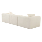 Tarra 118-Inch Modular Sofa in styled contemporary lounge setting with neutral accents
