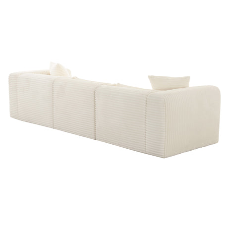 Tarra 118-Inch Modular Sofa in styled contemporary lounge setting with neutral accents