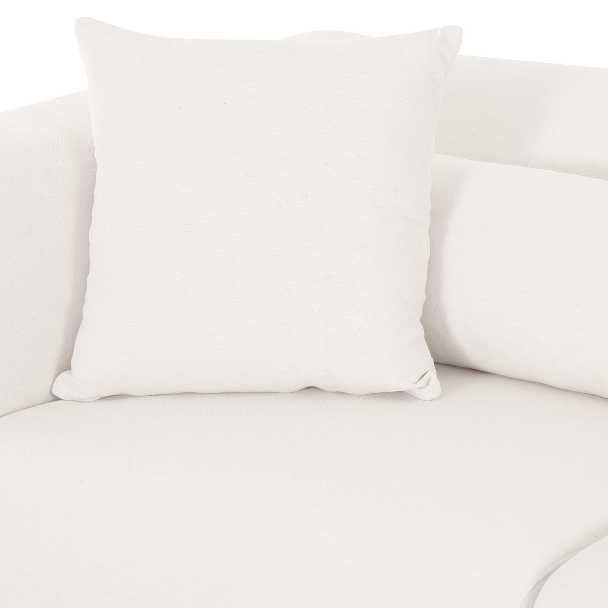 Tarra modular sofa back angle showcasing low-profile tailored silhouette