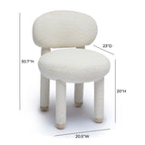 Manu Performance Fabric Side Chair styled as an accent chair next to a bookcase