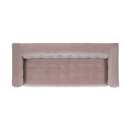 Three-quarter room view of Jules 94-Inch velvet sofa with accent furnishings