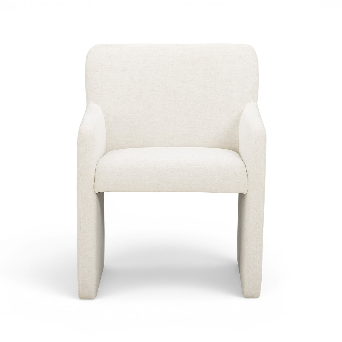 Crawley upholstered dining armchair angle perspective highlighting rounded arms