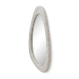 Side profile angle of the Klaryss fabric-wrapped neutral floral wood frame mirror