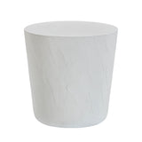 Margot Indoor Outdoor Concrete Stool paired beside outdoor lounge furniture