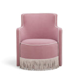 Passe Tasseled Velvet Swivel Accent Chair in Pink angled side perspective
