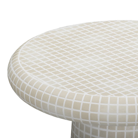 High-angle view of the round mosaic tiled top on the Monica accent table