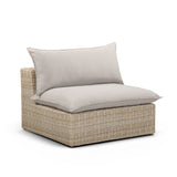 Cali outdoor armless chair in natural wicker with grey performance fabric seat and back cushion front view
