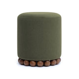 Dex round ottoman styled alongside accent side table