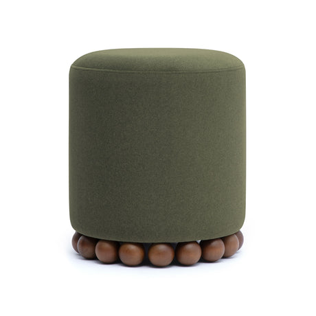 Dex round ottoman styled alongside accent side table