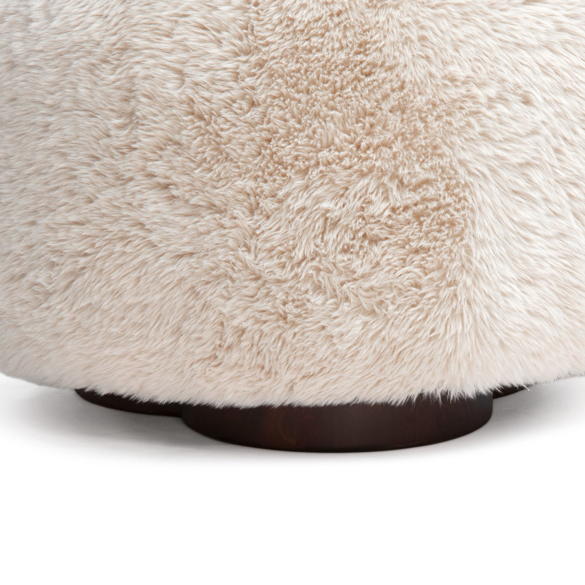 Oopa Swivel Ottoman three-quarter view showing three-leaf clover base design