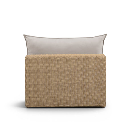 Cali outdoor armless chair with grey performance fabric cushions and brown wicker frame