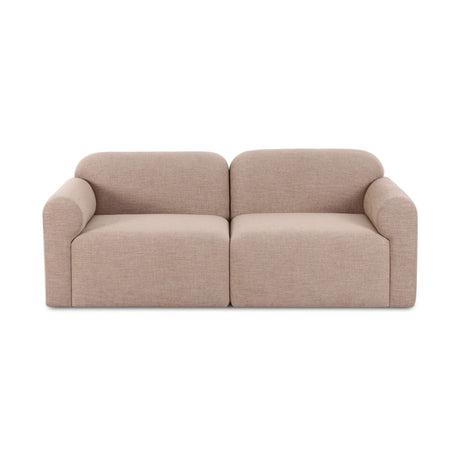 Gorge modular loveseat in tan fabric three-quarter angle showcasing plush silhouette