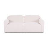 Gorge 81 inch modular loveseat upholstered in cream performance fabric front view