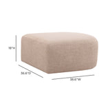 Lifestyle perspective of the Gorge performance fabric ottoman paired with modular sectional seating