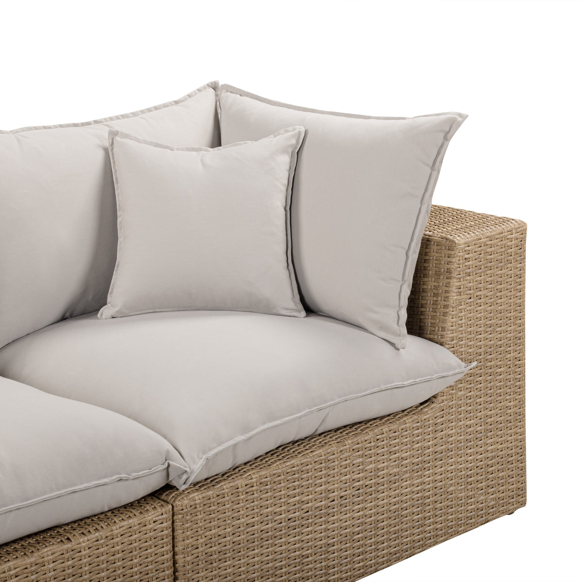 Cali outdoor wicker loveseat staged on a contemporary covered outdoor terrace
