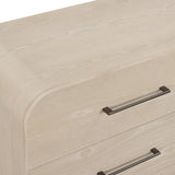 Marissa ash wood dresser paired with a bedroom vanity mirror and table lamp