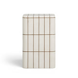Ecru concrete side table used as bedside table in contemporary bedroom
