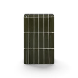 Tatiana concrete indoor outdoor table side view highlighting monolithic silhouette