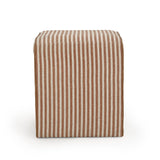 Byron Square Cotton Jute Ottoman styled as a footstool near accent chair