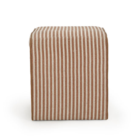 Byron Square Cotton Jute Ottoman styled as a footstool near accent chair