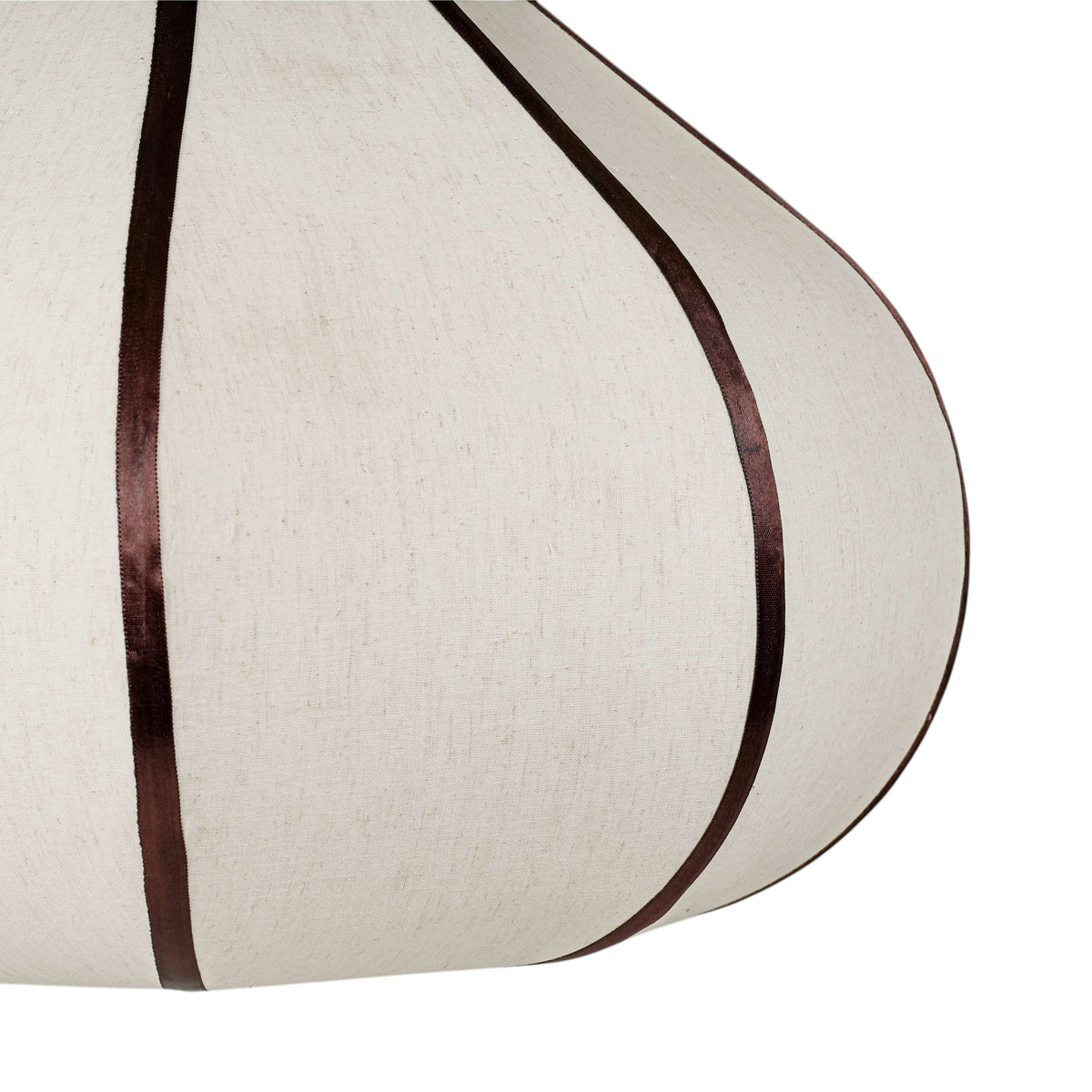 Close-up detail of contrast edge piping along the woven fabric pendant lamp