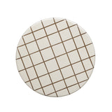 Detail view of graphic embossed grid on Tatiana concrete side table