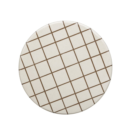 Detail view of graphic embossed grid on Tatiana concrete side table