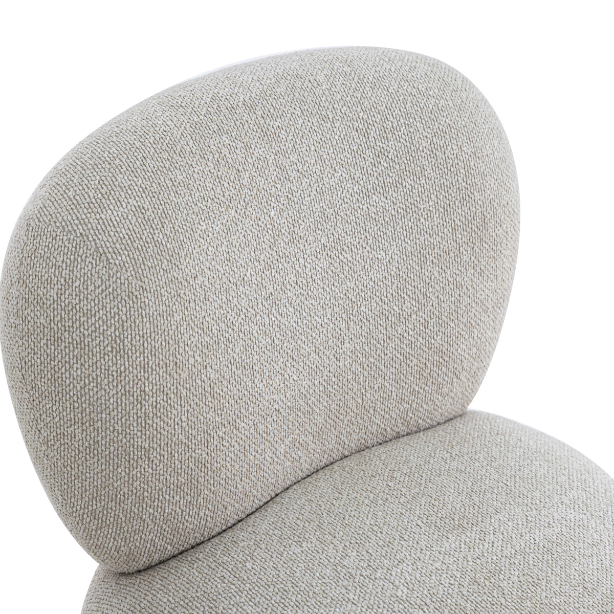 Close-up detail of the plush vegan shearling fabric weave on the Pucker Accent Chair