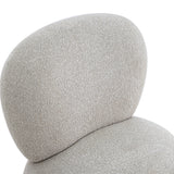 Close-up detail of the plush vegan shearling fabric weave on the Pucker Accent Chair