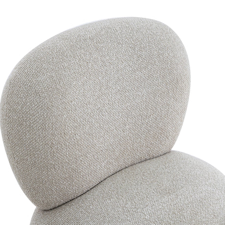 Close-up detail of the plush vegan shearling fabric weave on the Pucker Accent Chair