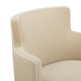 Passe Tasseled Velvet Swivel Accent Chair in Tan styled in a luxury bedroom sitting area