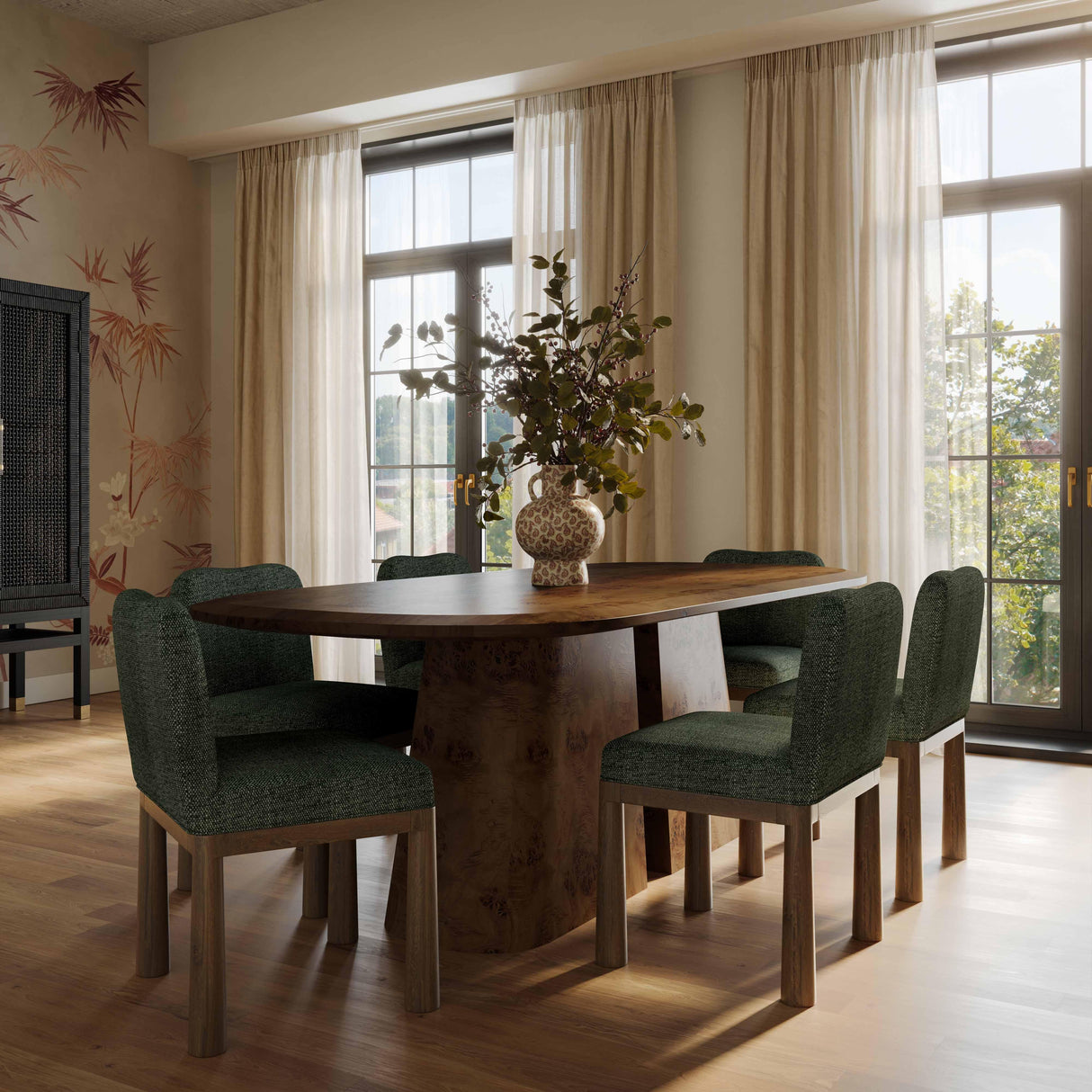 Dining room with wooden table and green chairs near large windows.